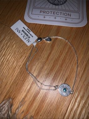 NWT Alex and Ani Silver Evil Eye Bracelet with Blue Crystal Accent